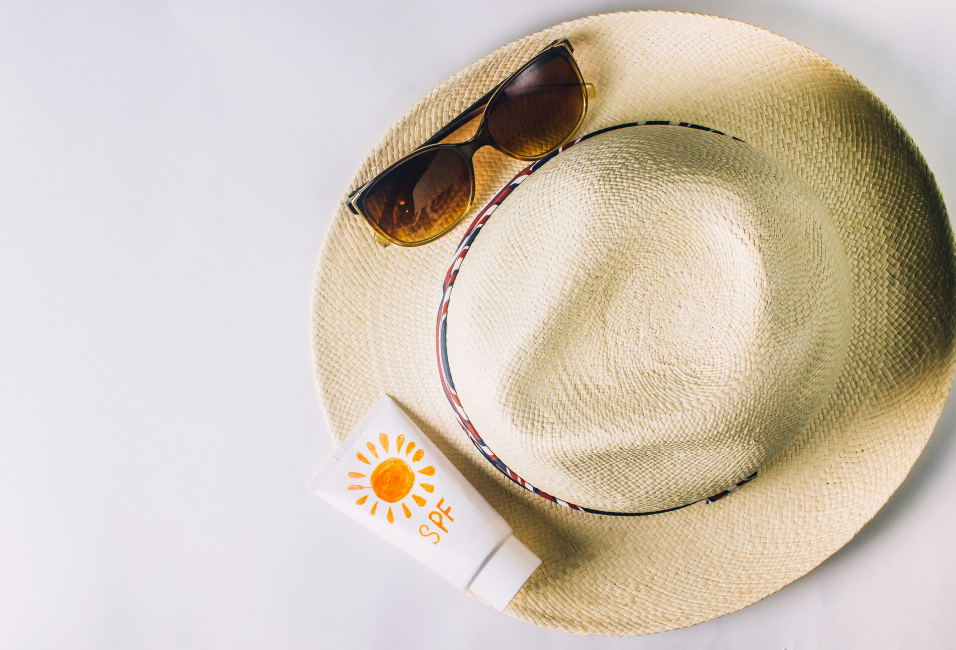 why should you use sunscreen and a hat when you are out in the sun?
