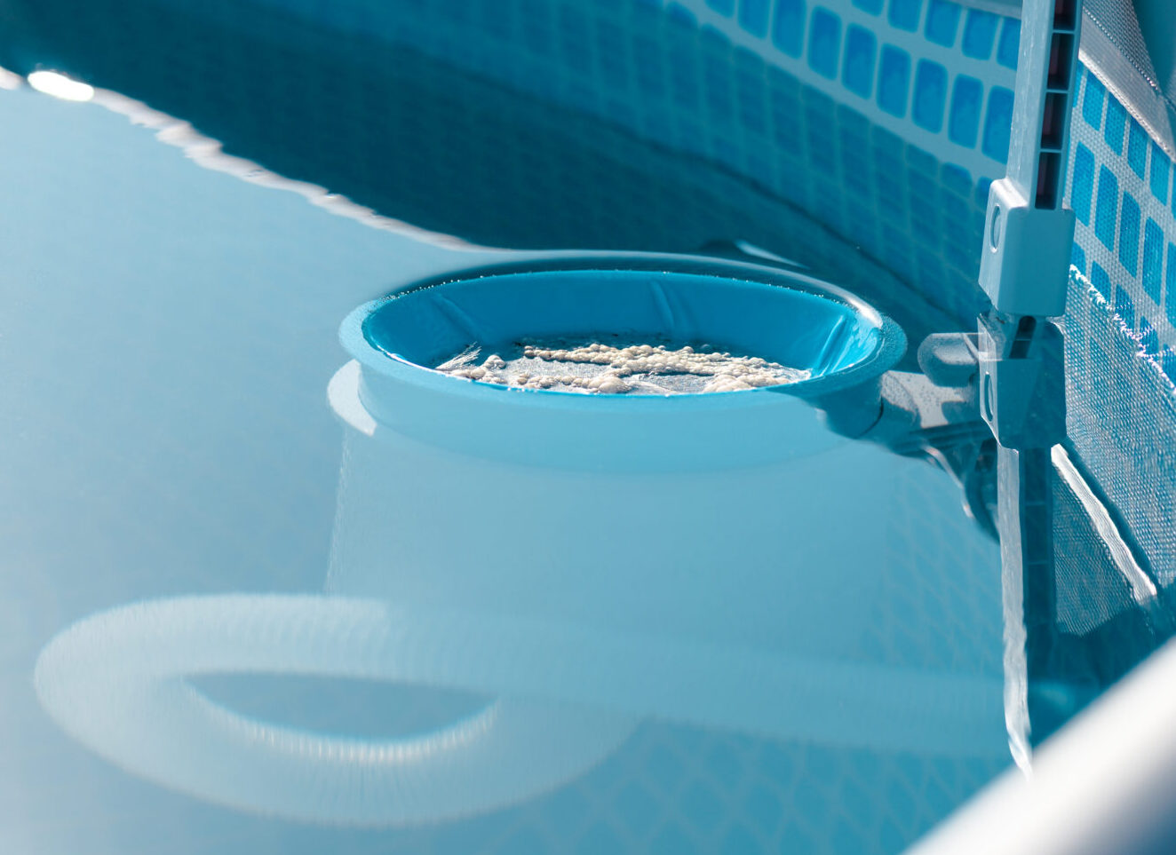A skimmer for the pool. A device for cleaning the pool from debris and leaves.