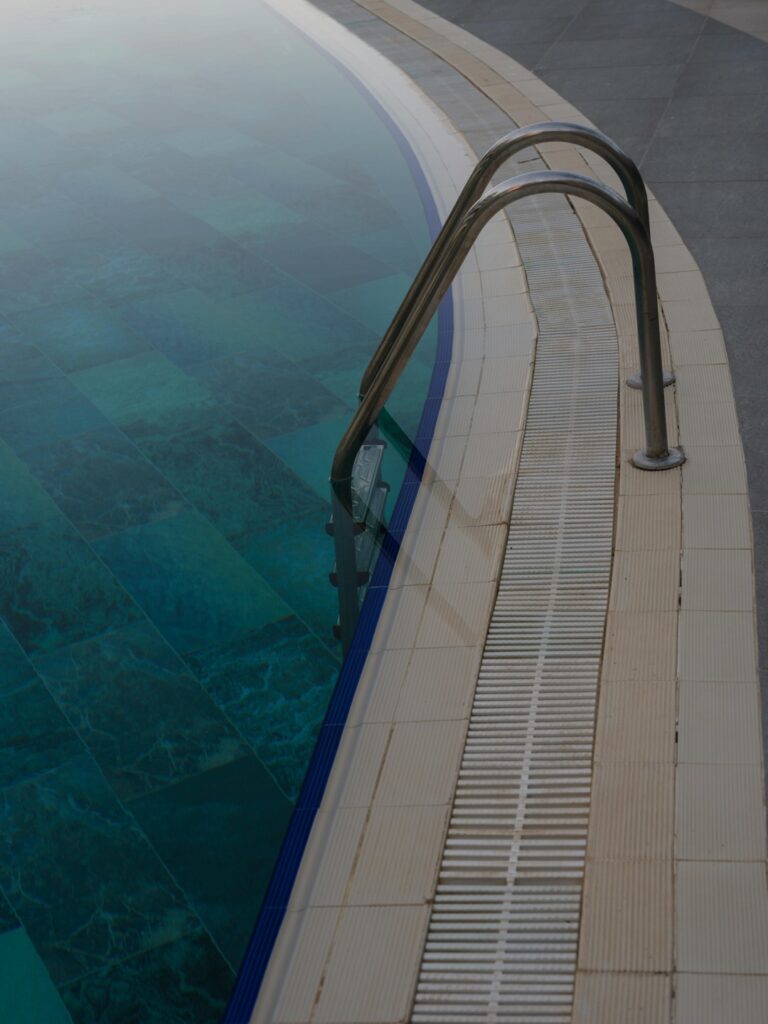 10 Best Pool Deck Drainage Strategies for Minimizing Maintenance This Summer